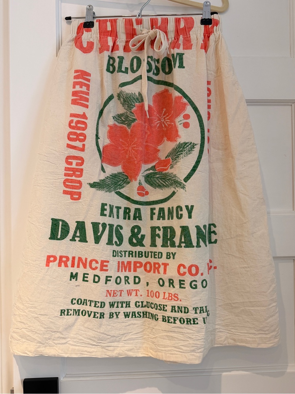Cream Graphic Print Midi Skirt with Red & Green Floral Motif